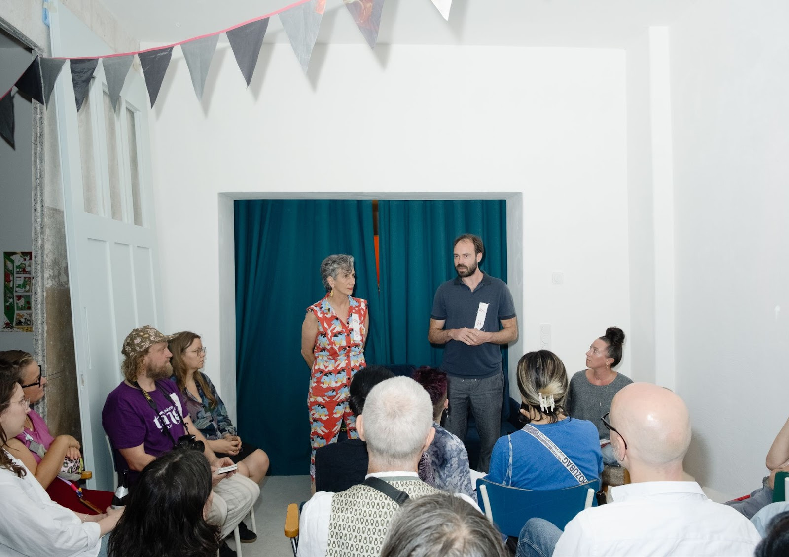 April and Stefan greeting the audience at FLYLEAF 2025 fireside chats