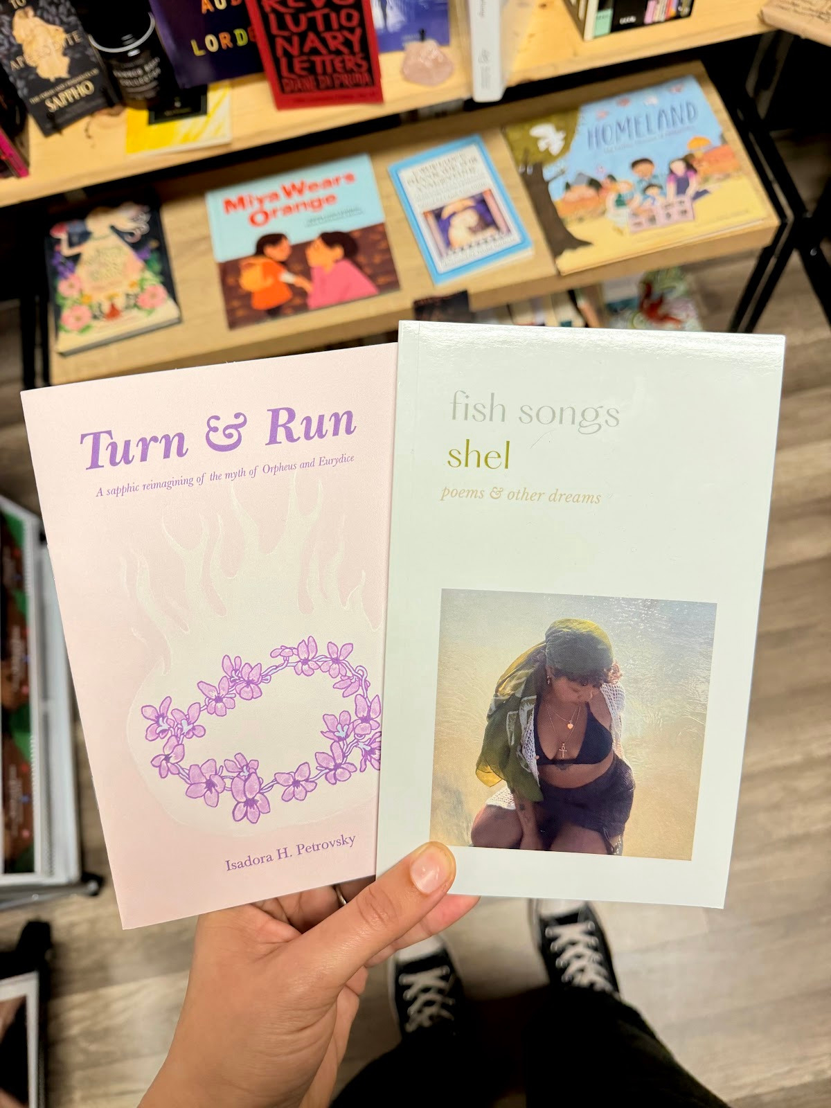 Some of the zines currently on the rack at The Feminist Bookstore.