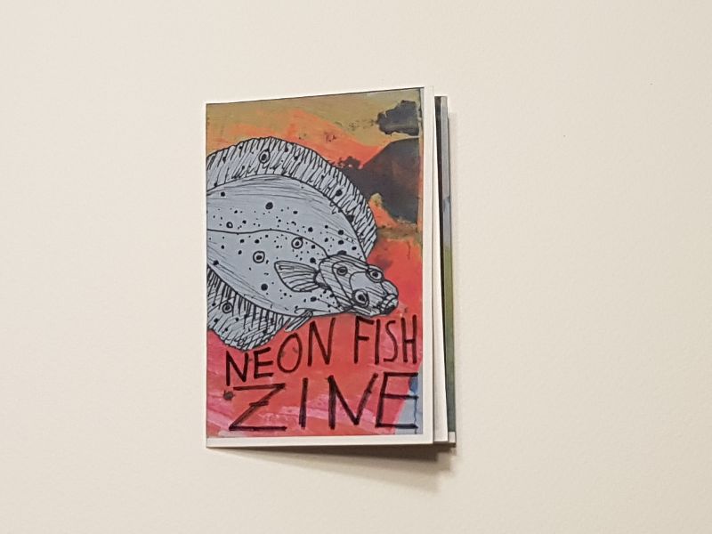 Neon fish zine cover